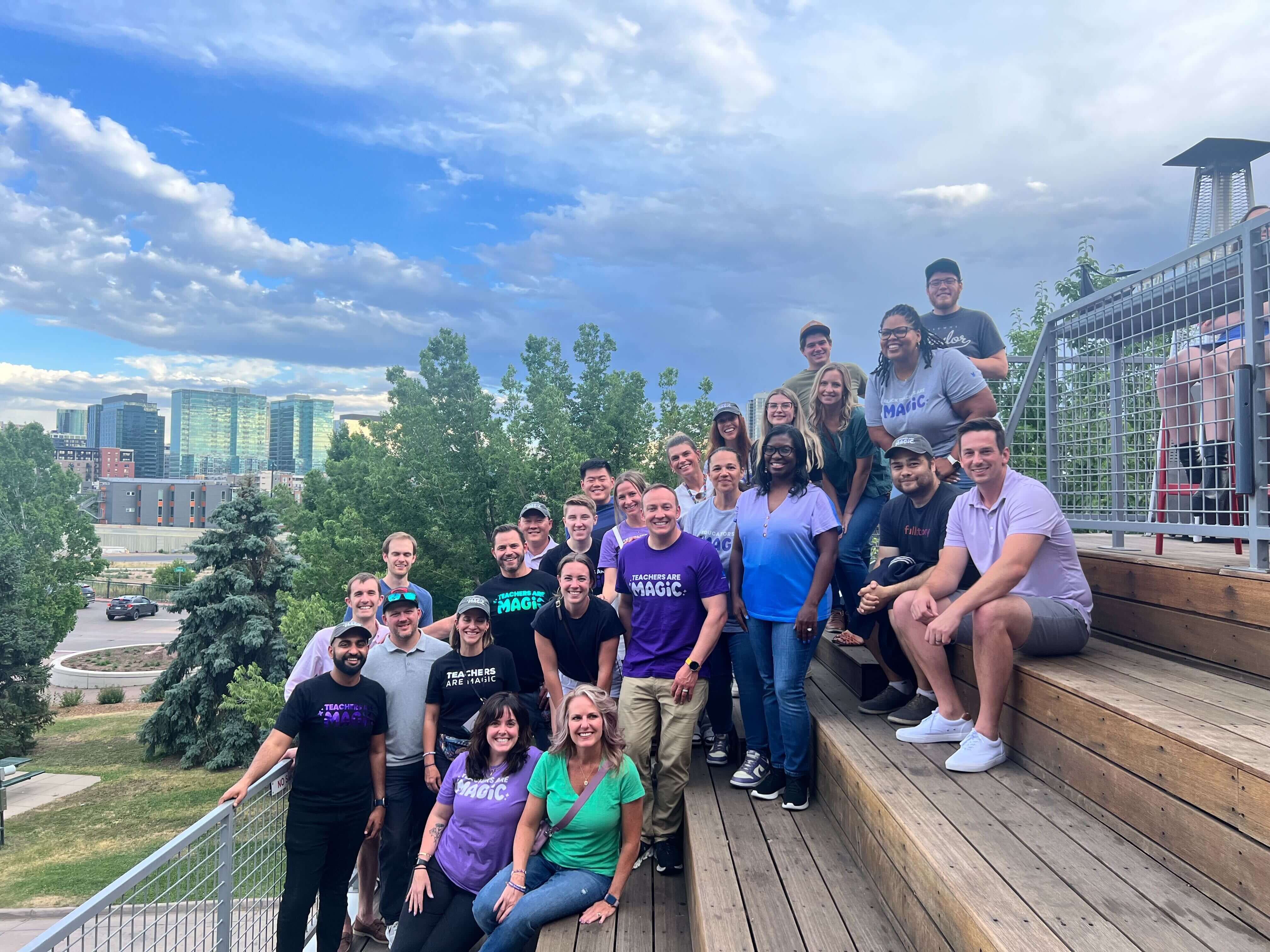 The MagicSchool team in a group photo in front of The Prestige